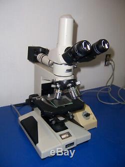 10923 Nikon Optiphot Microscope M Plan 5,10,20,40x lens with 15x ultra W. F. Eyes