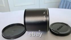 Nikon Plan 1x stereomicroscope objective with both front and rear caps